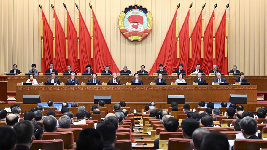 全國政協(xié)十四屆常委會第一次會議開幕 王滬寧出席
