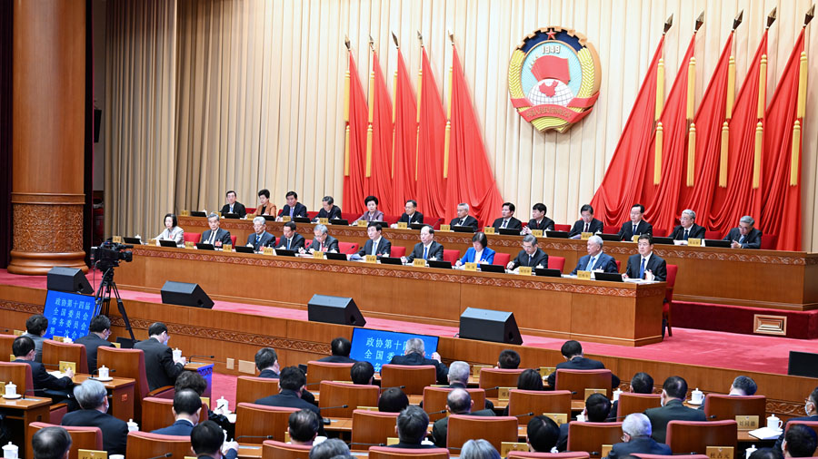 全國政協(xié)十四屆常委會第一次會議閉幕 王滬寧主持并講話