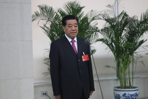 中央政治局常委、全國政協(xié)賈慶林講話。 程煒 攝