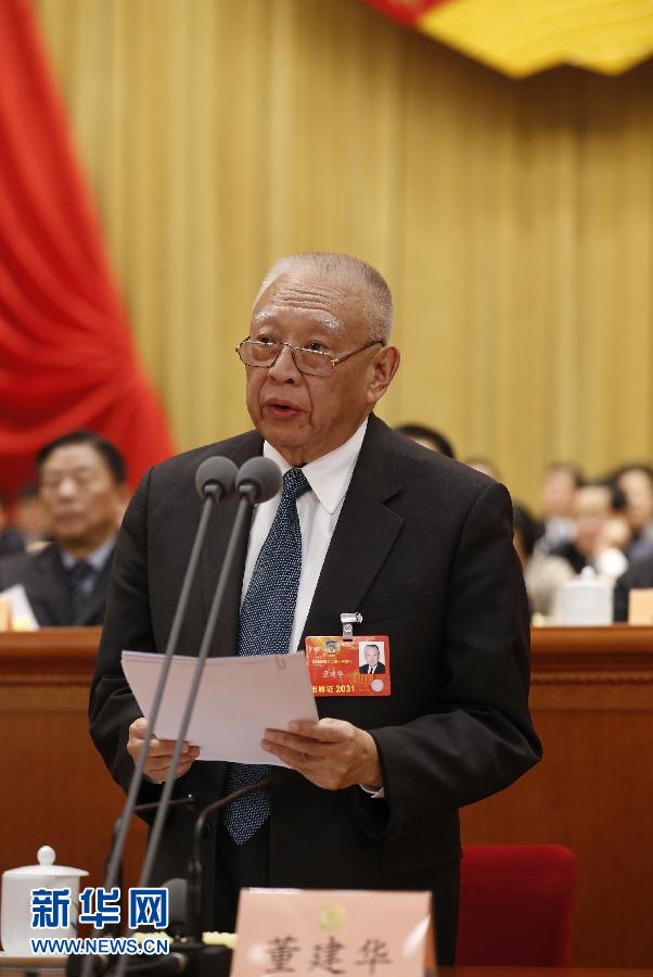 3月7日，全國政協(xié)十二屆一次會議在北京人民大會堂舉行第二次全體會議。董建華主持會議。 新華社記者 鞠鵬 攝