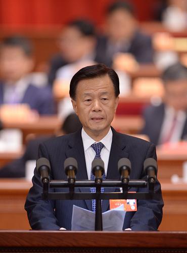 3月8日，全國(guó)政協(xié)十二屆一次會(huì)議在北京人民大會(huì)堂舉行第三次全體會(huì)議。這是許榮茂委員作《借鑒香港基層管理經(jīng)驗(yàn) 推動(dòng)內(nèi)地“幸福社區(qū)”建設(shè)》的發(fā)言。新華社記者 王曄 攝